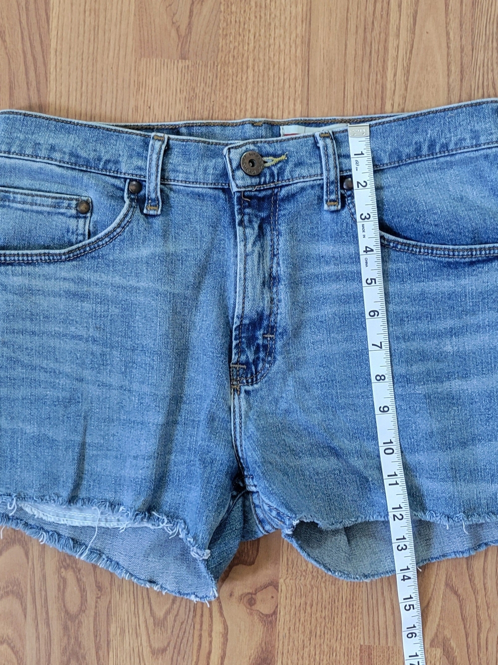 Wrangler Blue Denim Cutoff Shorts with Frayed Hem